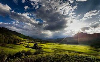 Sun Shining Bright On The Green Valley Wallpaper