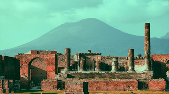 Ancient Ruins Of Pompeii In The Background Volcano
