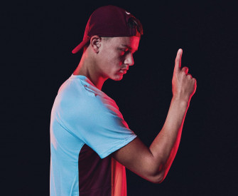 Emerging Tennis Star Holger Rune In Action Wallpaper