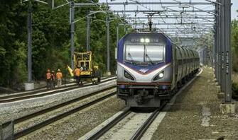 Amtrak Train At Kingston With New Track In The Background