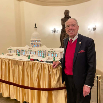 Chuck Grassley In A Discussion Session On Capitol Hill Wallpaper