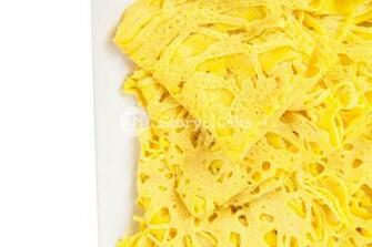 Malaysian Dish Net Pancake Or Roti Jalan Over White Background