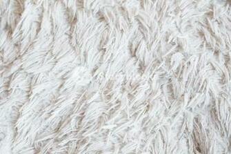 Furry White Blanket Or Cloth Textured Warm Cozy And Comfy Fabric