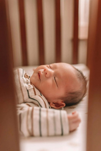Newborn Baby Sleeping In Crib Picture Wallpaper