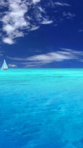Light Blue Ocean And Sailboat iPhone Wallpaper