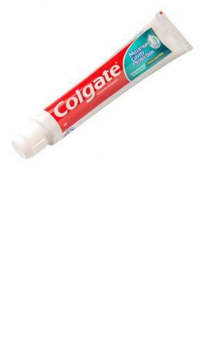 Colgate Toothpaste Over White Background Royalty Stock Image