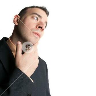 Young Business Man That Looks Worried Or Contemplative Isolated