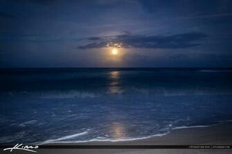 Full Moon Rise Over Ocean At Beach
