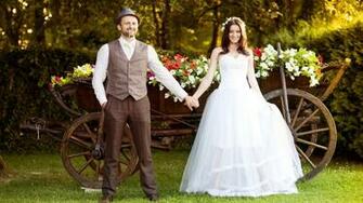 Bride And Groom On The Background Color Of Cart
