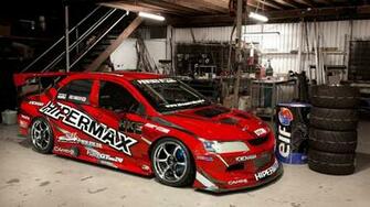 Evolution In Garage HD Wallpaper 1080p Cars Background