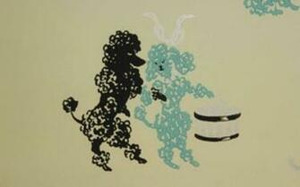 This Roll Of Vintage Wallpaper Has Poodles On A Yellow Background