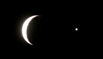 The Moon And Planet Venus A Crescent Star Here
