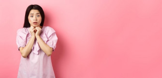 Scared Timid Girl Looking Worried Camera Standing Concerned Pink Background Wallpaper