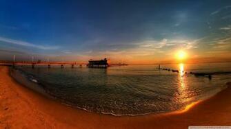 Amazing Sunrise On Ocean Pier Wallpaper
