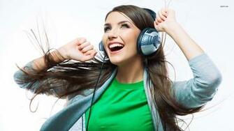 Happy Girl Listening To Music