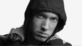 Eminem Face Closeup Hudd On Head Looking At Camera Wallpaper