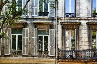 White Wooden Louvre Window Open On Painted Building