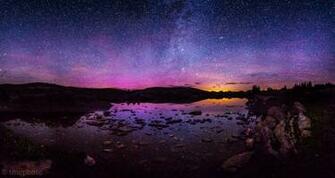 Aurora Borealis Reflected In A Small Pond Near Aspen Colorado Shot