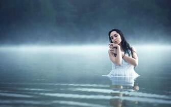 Woman In The Foggy Lake Wallpaper