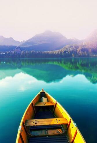 Rowboat In Blue Water Mountains Boats Ships Boat