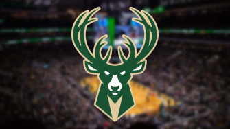 A Group Of Bucks Grazing In Valley Wallpaper