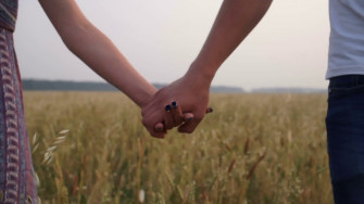 Boy And Girl Holding Hands Wallpaper