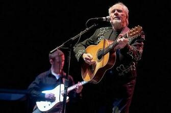 Merle Haggard With Son Ben In The Background At Houston S Verizon
