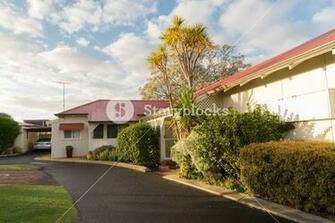 Path In Garden With Traditional Houses The Background Perth