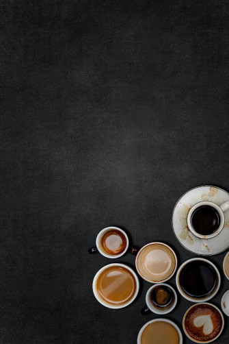 Image Of Coffee Cups On A Black Textured Wallpaper