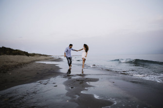 Couple At The Beach Wallpaper