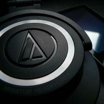 Audio Technica Ath M50 And Mp3 Player Wallpaper