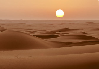 The Sun Over Desert Desktop Wallpaper