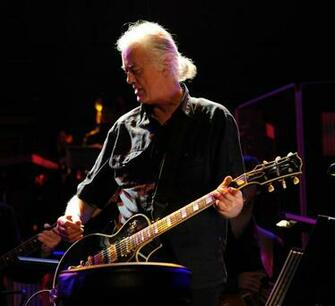 Led Zeppelin S Jimmy Laughs Plays Air Guitar In Court Cbs News