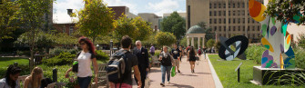 Energized Students Walking Across The Campus Of George Wallpaper