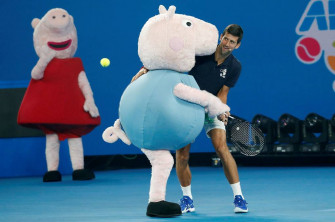 This Week In Photos Djokovic Teases Peppa Pig Putin Pets Puppy