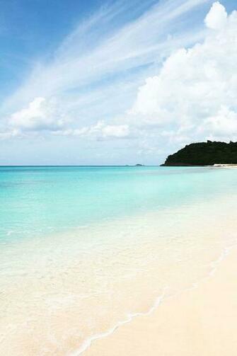Sunny Beach And Crystal Blue Sea Wallpaper