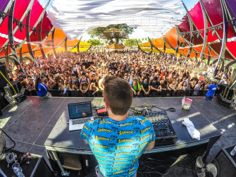 Dj On Stage In Front Of Audience Photo Concert Image