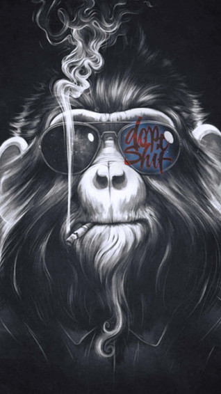A Smartphone With Smiling Monkey Emblem Wallpaper