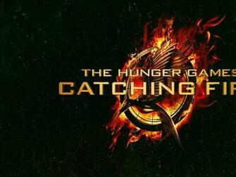Hunger Games Catching Fire Logo In Green Background Wallpaper And
