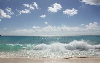 Waves On A Sunny Day Wallpaper Beach