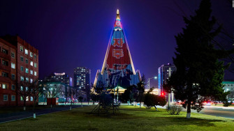 Ryugyong Hotel Illuminated At Night In Pyongyang North Korea Wallpaper