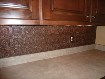 Textured Wallpaper Backsplash Painted With Aged Copper Paint