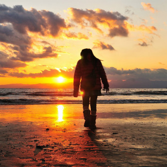 Sea Beach Light Sunset People Walk Alone iPad Pro Wallpaper