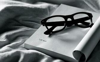 Reading Ray Ban Glasses Wallpaper Stock