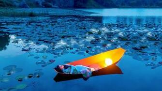 Woman In A Boat Wallpaper