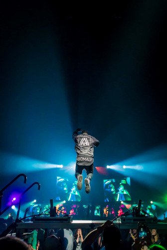 Music Legend Juice Wrld Performing A Passionate Concert Wallpaper