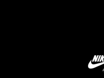 Nike Logo On A Black Background Wallpaper And Image