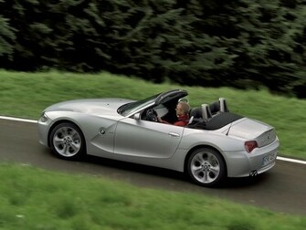 Bmw Z4 M Roadster Silver Rear Angle Speed Wallpaper