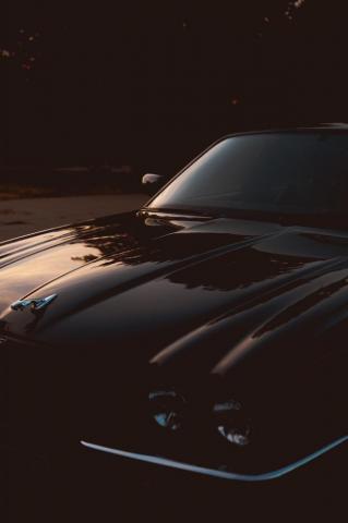 Black Car On Asphalt Road During Night Time Photo