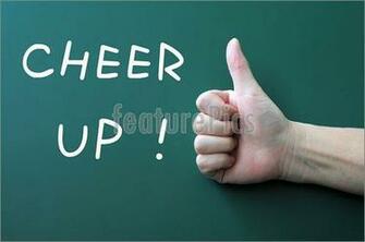 Picture Of Cheer Up Written On A Blackboard Background With Thumb